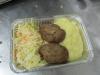 Mashed potatoes, two delicate steamed chicken cutlets and a vegetable salad — a homemade meal, suitable for the hospital patients